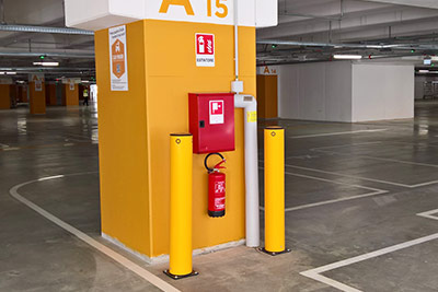 parking garage bollards protect column