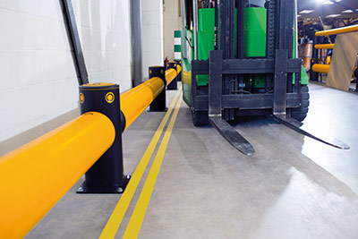 forklift guard rail protects wall from damage