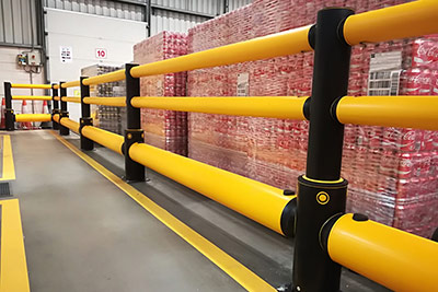 flexible guard rails in a warehouse loading bay area