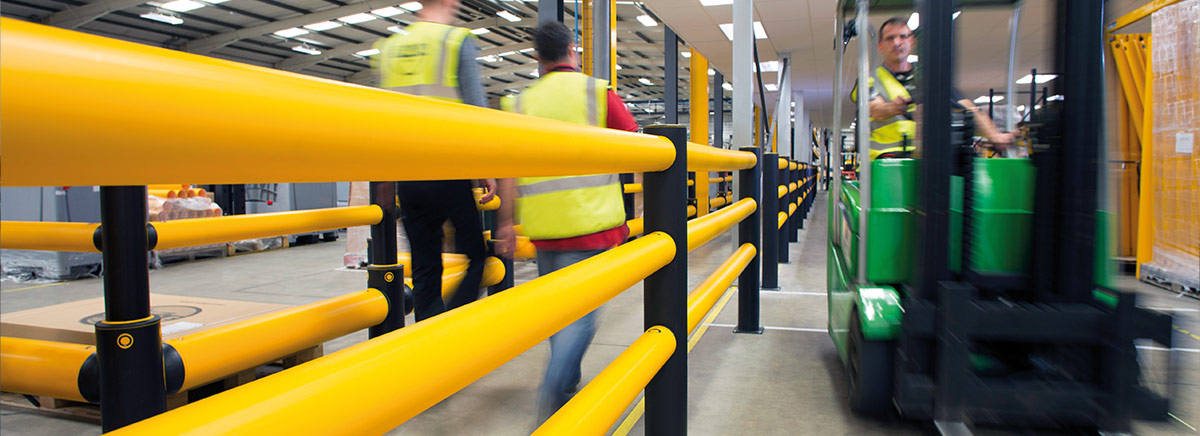 flexible guard rails prevent forklift accidents in busy warehouse environment