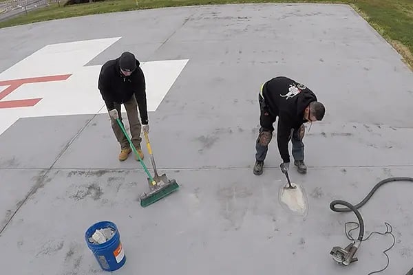 helipad demo work to remove loose concrete