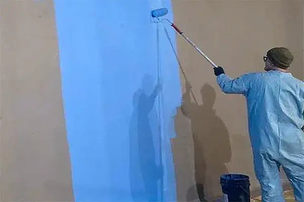 underground water storage tank coating roller application of blue Belzona 5812dw