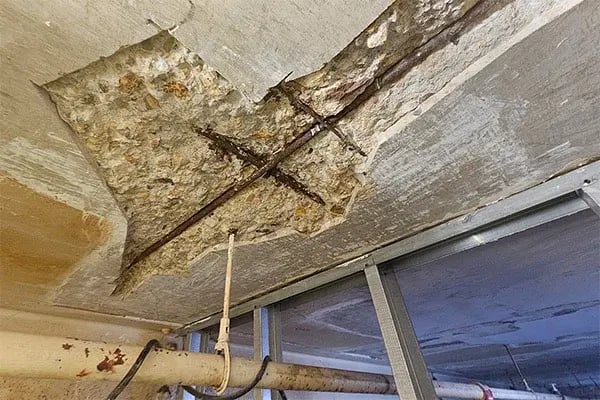 area of concrete deterioration cut out and ready for filling