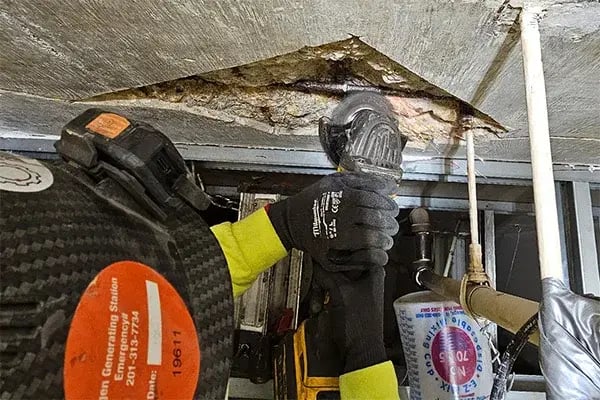 rebar corrosion grinding prep work for concrete repair