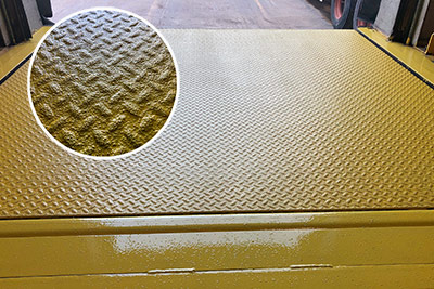 slip reduction coating applied to dock leveler