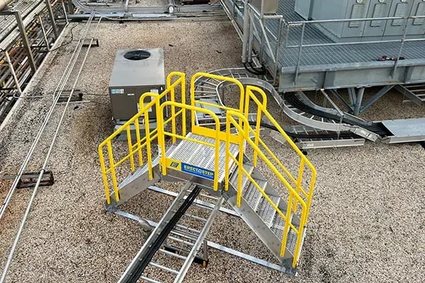 rooftop crossover stairs give safe access over high voltage electrical cable trays