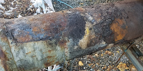 example of severly corroded pipe