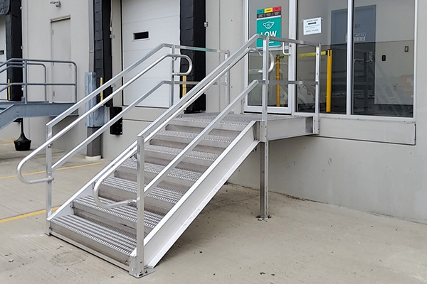 osh compliant loading dock metal stairs near loading bays