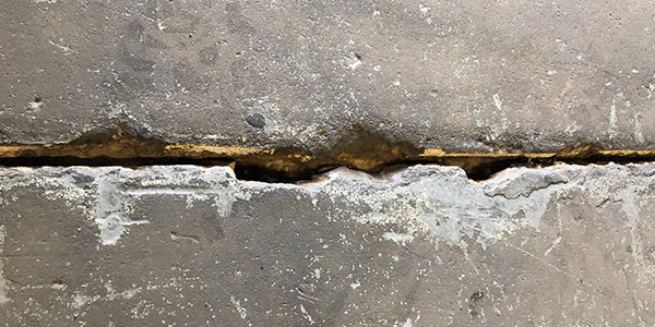 example of damaged warehouse floor expansion joint
