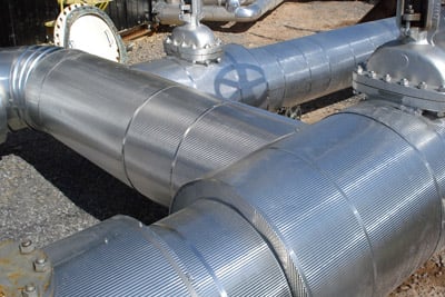 metal jacket pipe insulation shown at industrial facility