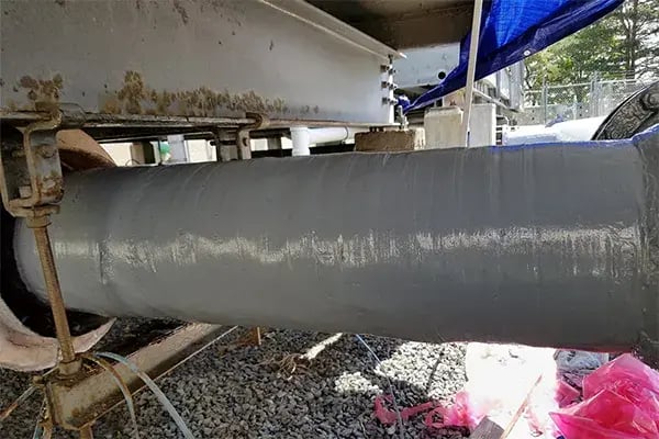 final protective coating over cooling tower pipe wrap- corrosion repair