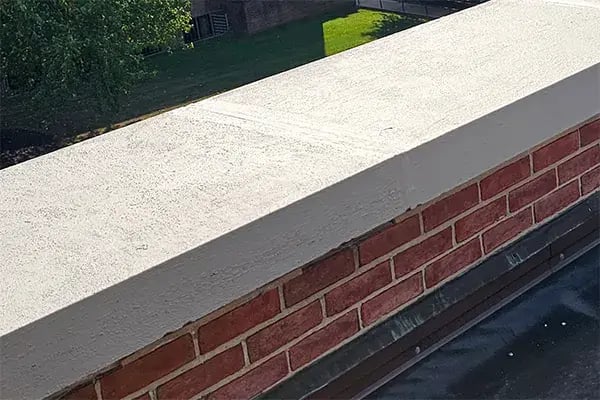 capstone coated with Belzona 3111 Flexible Membrane to seal and encapsulate the masonry