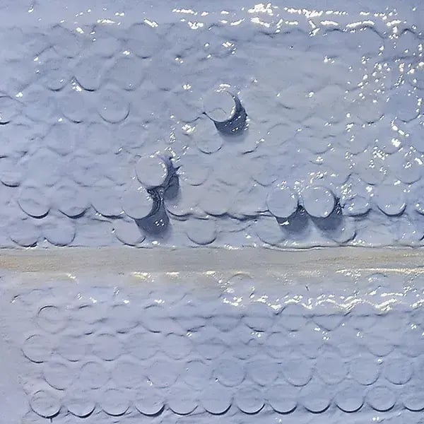 detailed photos showing belzona 1341 part 2 blue coating applied to tube sheet