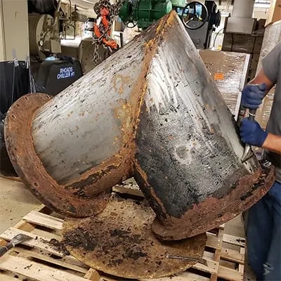 chiller compressor elbow corrosion exposed after insulation removal