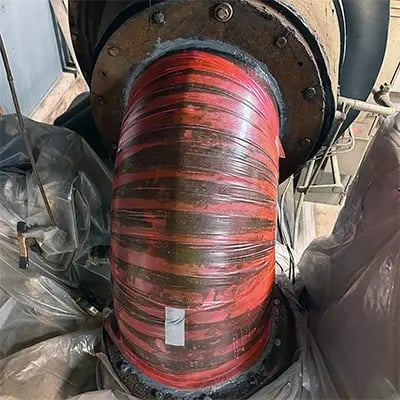 chiller compressor elbow corrosion repair superwrap held in place by red release film