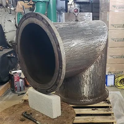 chiller compressor elbow surface prep for repair wrap