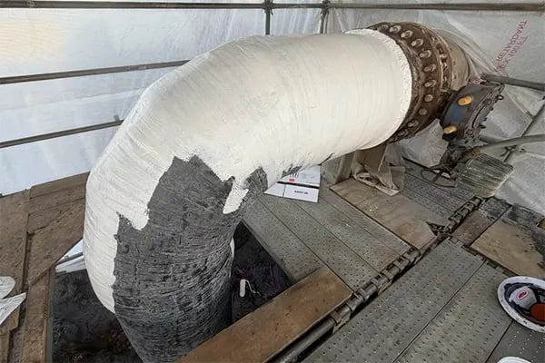 application of belzona 5831LT protective coating to cooling tower pipe wrap repair