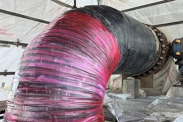 superwrap pipe repair of cooling tower pipe defect