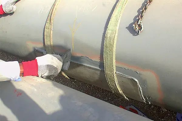 pipe wear pad replacement in process