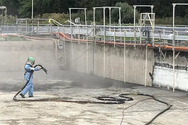 concrete tank repair work in progress