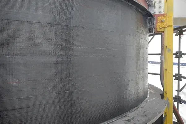 storage tank corrosion repair with carbon fiber wrap