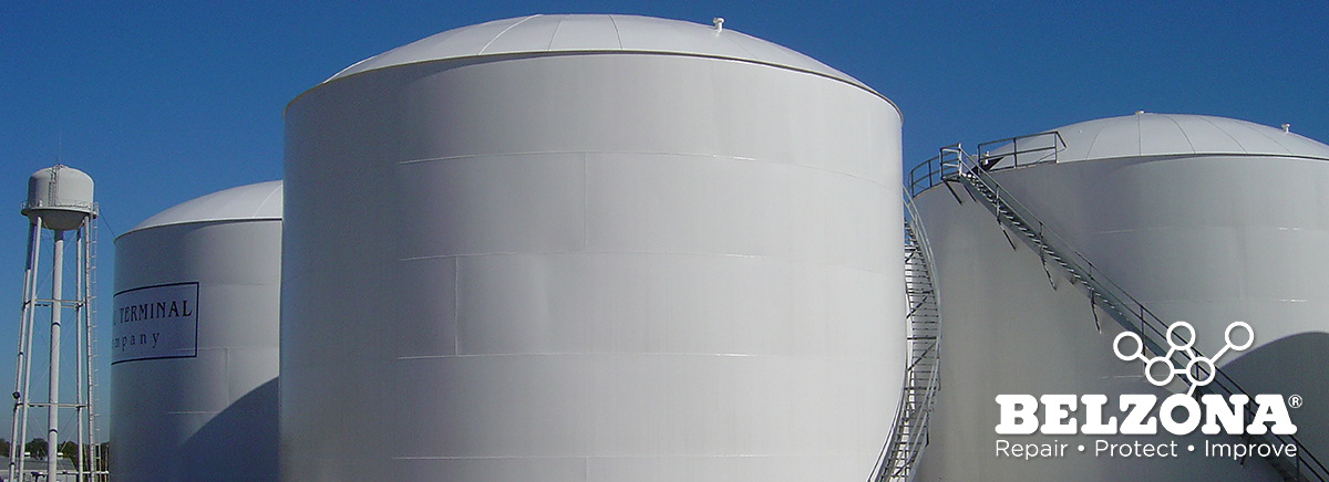 three large storage tanks with new protective coating finish