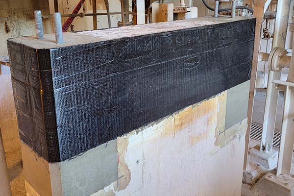 FRP wrap used to strengthen concrete equipment base