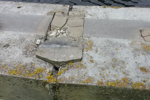 cracked expansion joint along clarifier skimmer arm wheel track