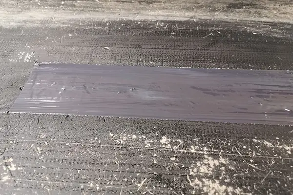 conveyor belt rip repair close-up