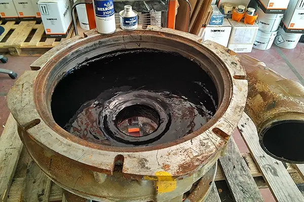 pump volute coated with elastomeric lining To protect against erosion