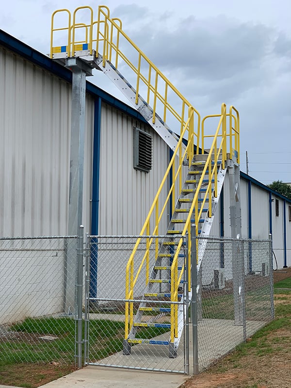 erectastep exterior roof access stairs provide safe egress to industrial roof for maintenance workers