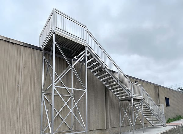 APEX exterior roof access stairs at a warehouse