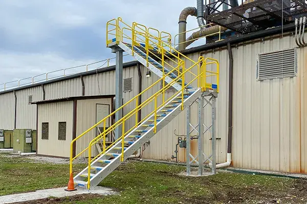 erectastep exterior roof access stairs provide safe access to a factory roof