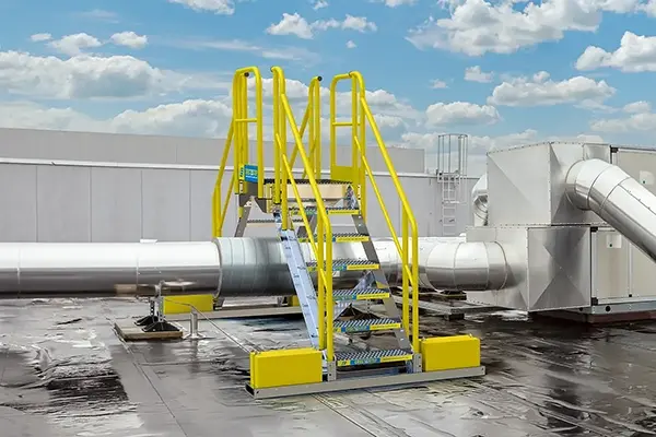 non-penetrating erectastep rooftop crossover stairs installed by banks industrial group for safe, osha-compliant access