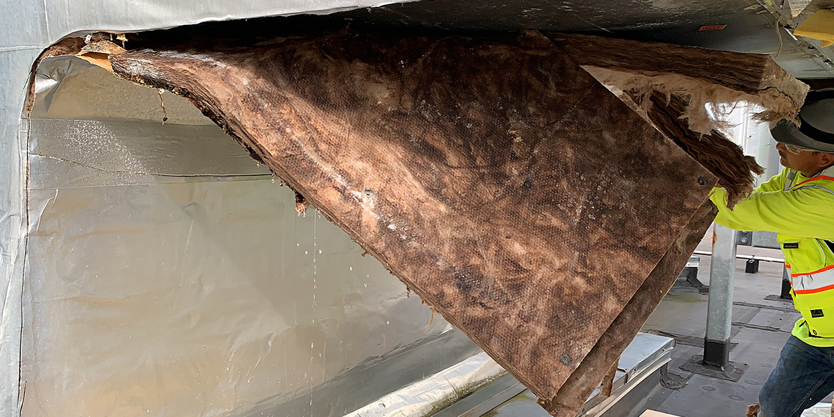 wet insulation causing problems on rooftop air ducts