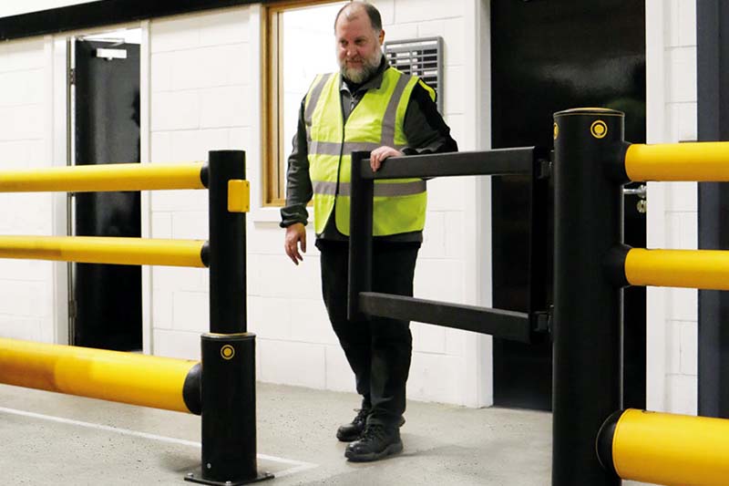 pedestrian swing gate in a-safe guard rail barrier