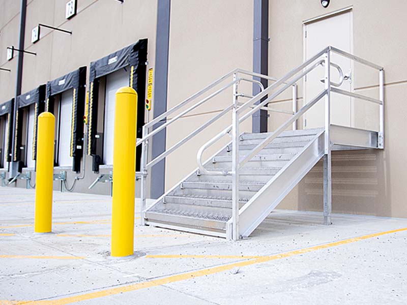 prefabricated aluminum loading dock stairs outside distribution center