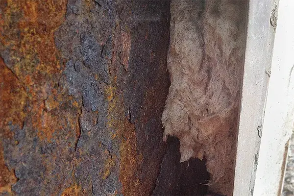 tank wall corrosion hidden under insulation detail