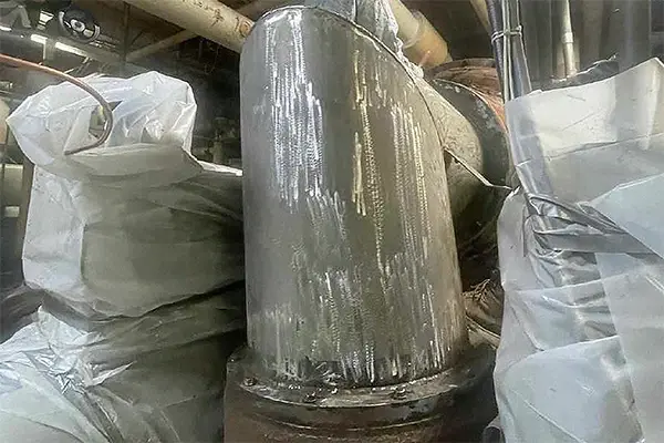 chiller corrosion under insulation remediation surface prep of compressor elbow down to white metal