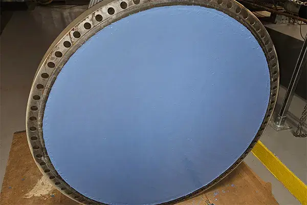 chiller end cap refurbished and coated with belzona
