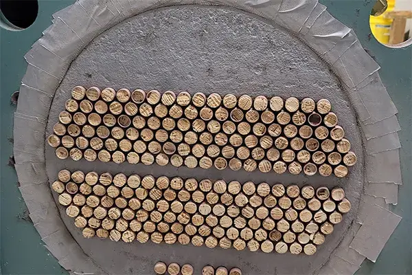 chiller tube sheet showing metal loss prepped for repair and coating