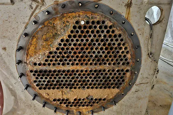 corroded chiller tube sheet before restoration