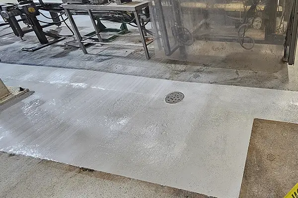 floor drain area with slip resistant Belzona 5231 epoxy floor coating