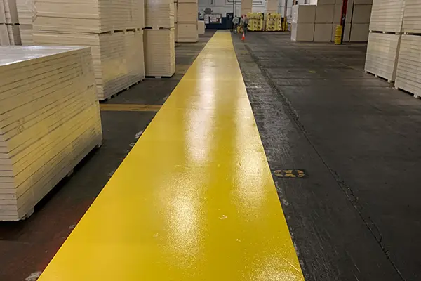 yellow non-slip floor coating used for walkway in warehouse