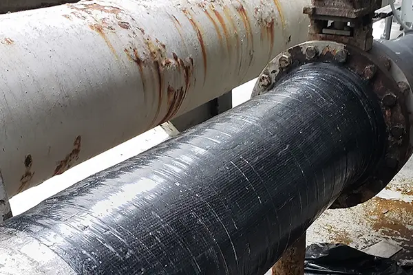epoxy composite wrap used to restore structural integrity of corroded pipe