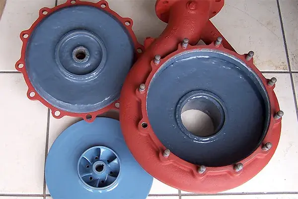 back plate volute and new impeller coated with belzona 1391 high temperature coating