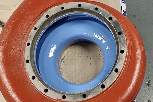 final coat of blue color belzona 1341 pump efficiency coating applied to suction pump volute casing