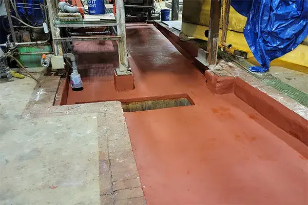 chemical containment area repaired with acid resistant belzona 4181 magma quartz mortar