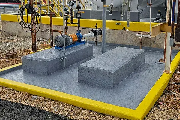 pump foundations and containment curb coated with chemical-resistant belzona