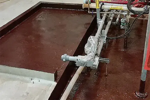 protective coating applied to sulfuric acid containment area